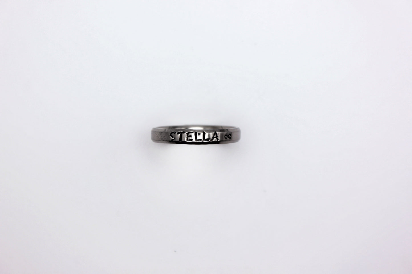 Polished Beveled Edge Stainless Steel Ring.